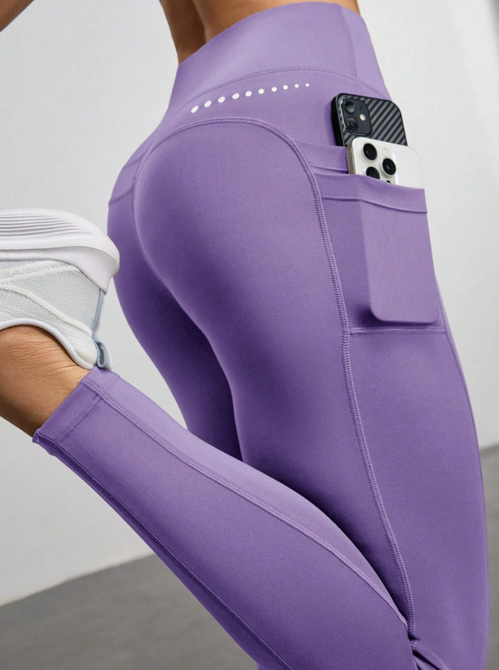 Legging de sport taille haute avec poches latérales