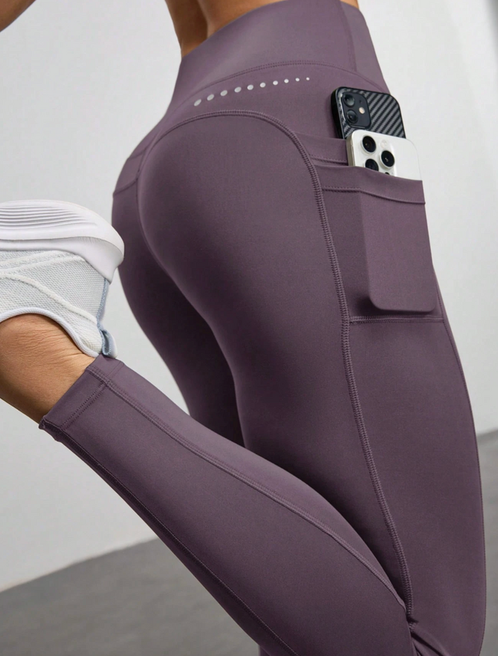 Legging de sport taille haute avec poches latérales