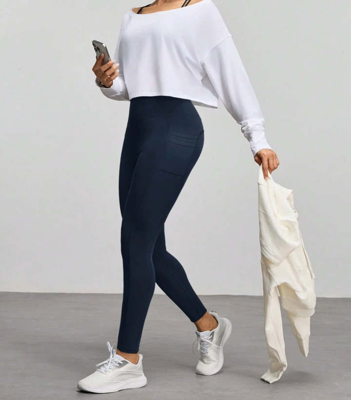 Legging de sport taille haute avec poches latérales