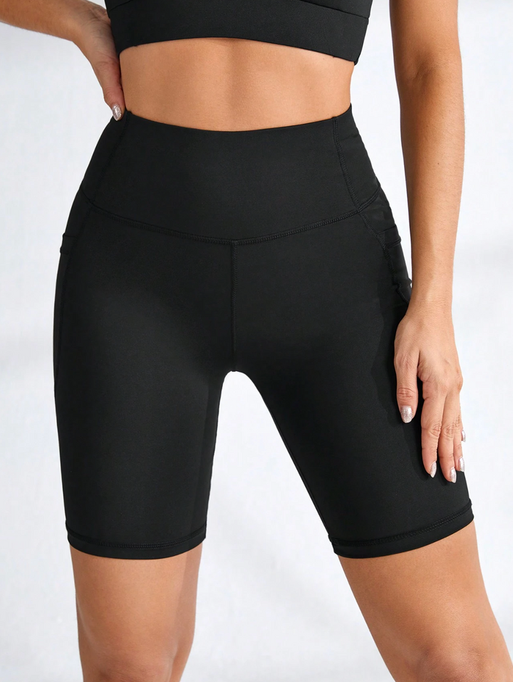 Legging de sport court taille haute avec poches latérales
