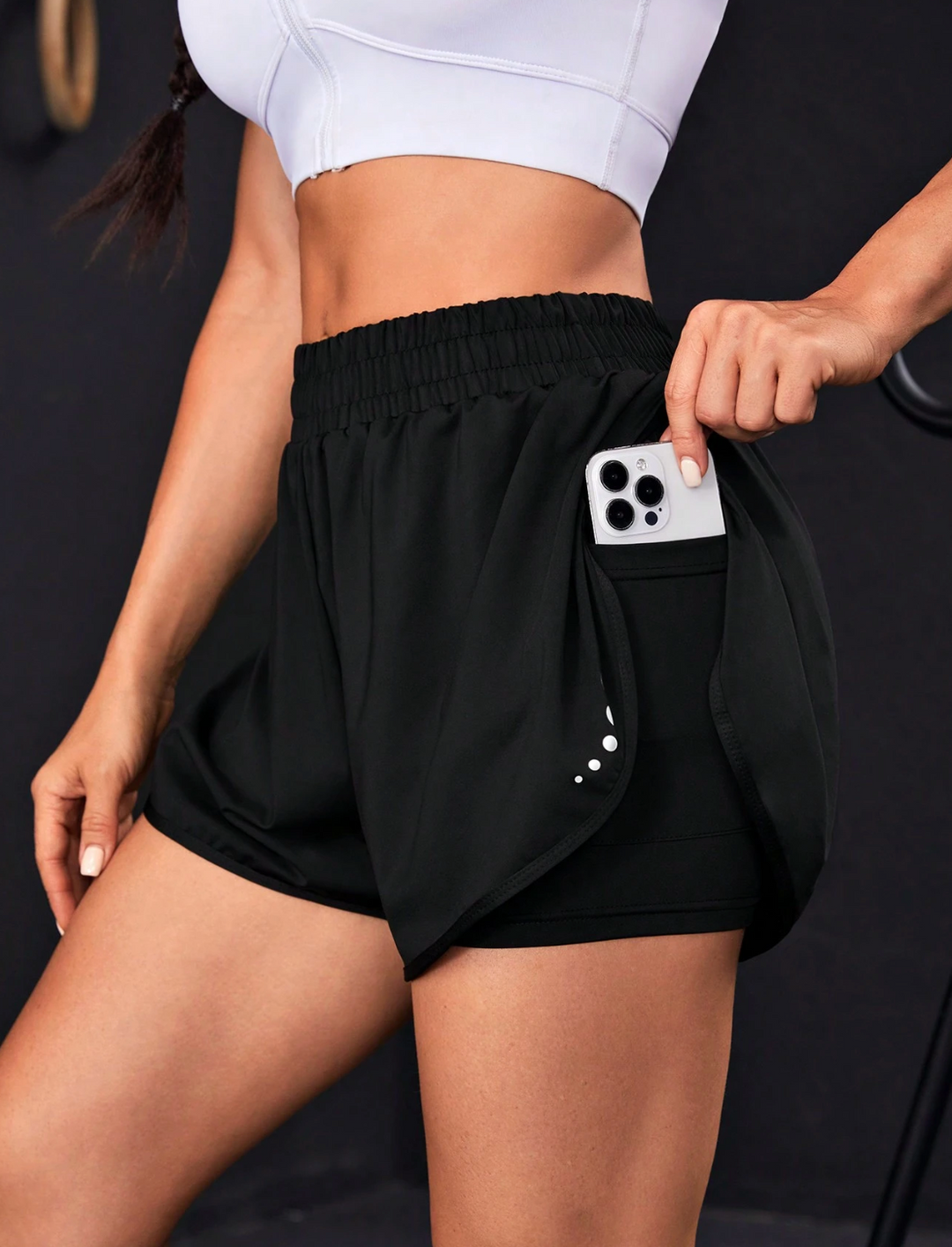 Short de sport taille haute avec poches intégrées