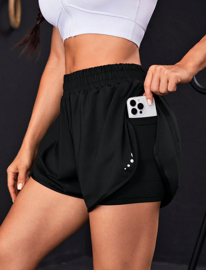 Short de sport taille haute avec poches intégrées